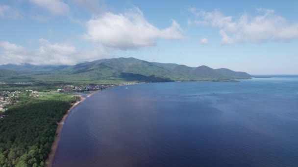 Summertime aerial imagery of Lake Baikal is a rift lake located in southern Siberia, Russia Baikal lake summer landscape view. Drones Eye View. — Stock Video