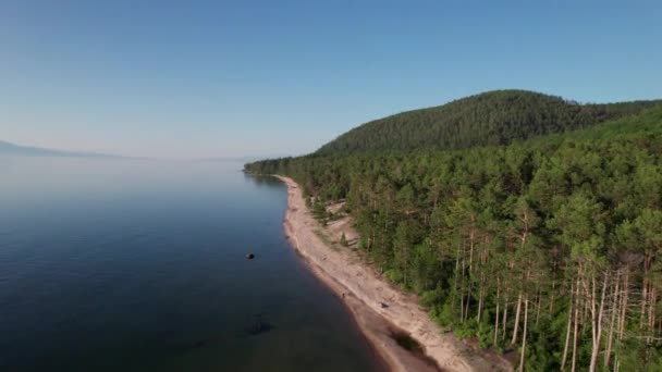 Summer evening aerial landscape of Lake Baikal is a rift lake located in southern Siberia, Russia Baikal lake summer landscape view. Drones Eye View. — Stock Video