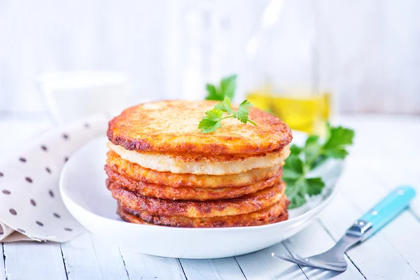 Potato pancakes on plate — Stock Photo, Image