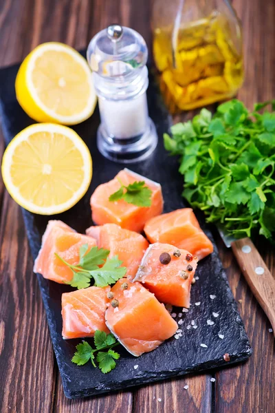 Red salmon  with fresh parsley — Stock Photo, Image