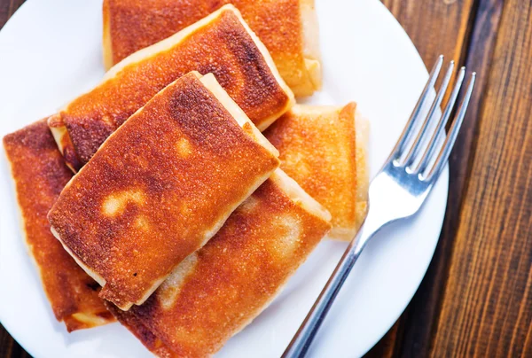 Pancakes on white plate — Stock Photo, Image