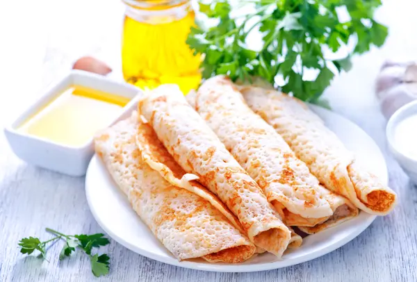 Pancakes with meat on the plate — Stock Photo, Image