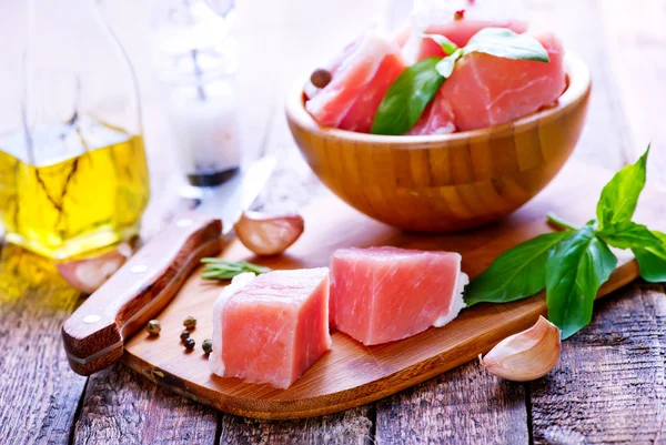 Raw meat in bowl — Stock Photo, Image