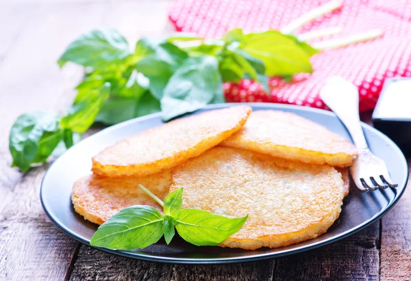 Potato pancakes on plate — Stock Photo, Image