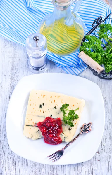 Cheese in white plate — Stock Photo, Image