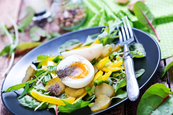 Tasty salad with egg — Stock Photo, Image