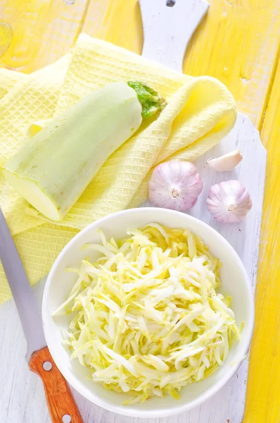 Fresh grated marrow in bowl — Stock Photo, Image