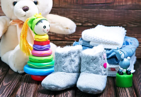 Baby clothes and shoes — Stock Photo, Image