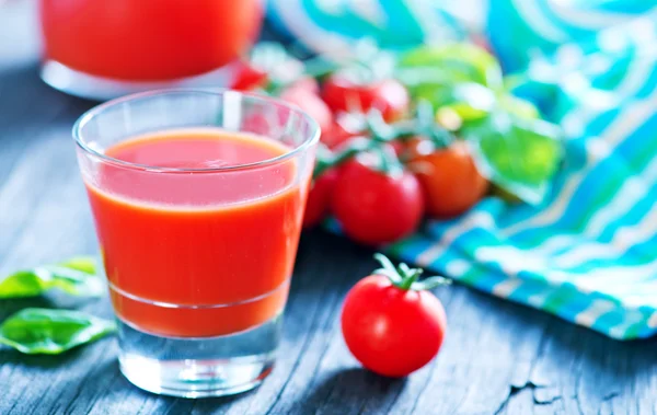 Tomato juice in glass — Stock Photo, Image