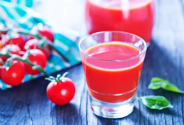 Tomato juice in glass — Stock Photo, Image