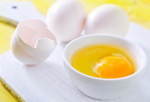 Raw eggs on background — Stock Photo, Image