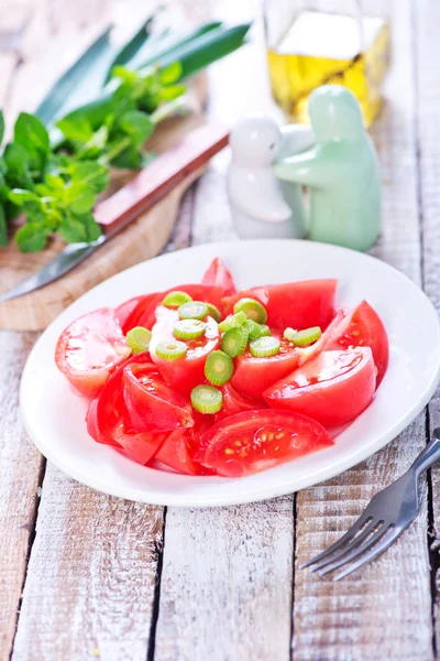 Tomato salad on plate — Stock Photo, Image