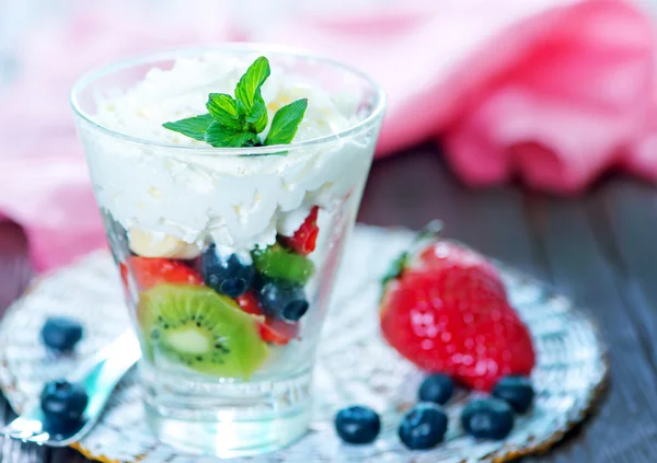 Fruit mix with whipped cream — Stock Photo, Image