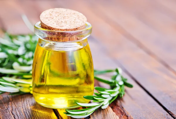 Rosemary oil in bottle — Stock Photo, Image