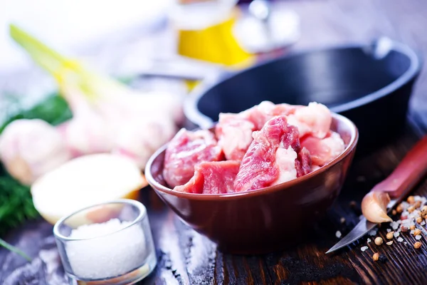 Raw meat with spices — Stock Photo, Image