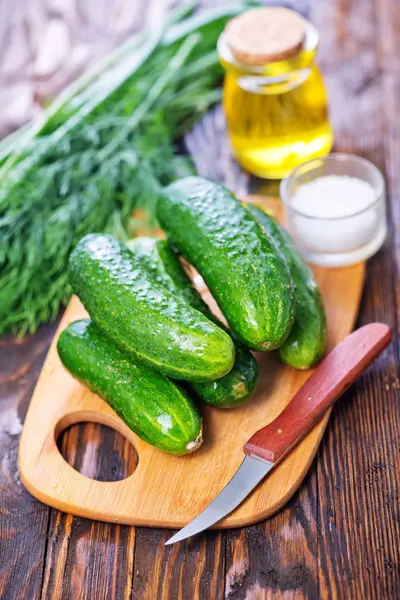 Fresh cucumbers and spices — Stock Photo, Image