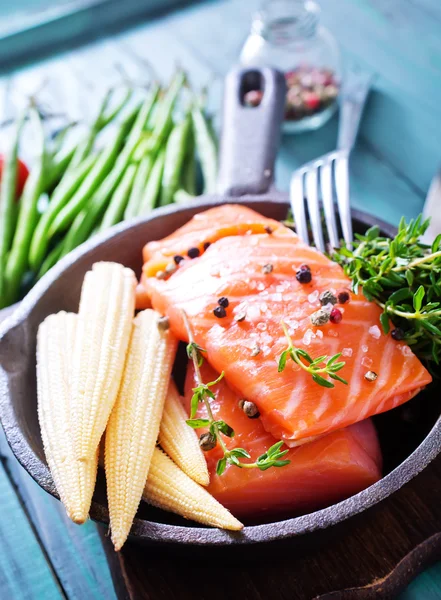 Raw salmon with spices — Stock Photo, Image
