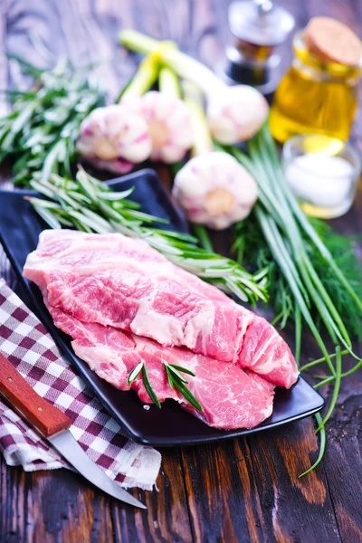 Raw meat with spices — Stock Photo, Image