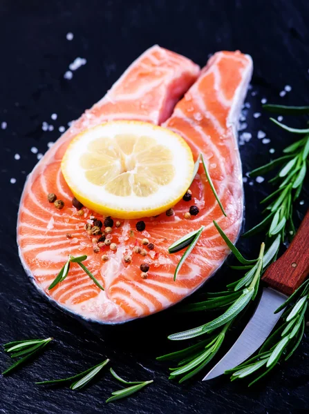 Fresh salmon with rosemary — Stock Photo, Image