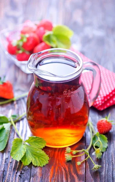 Strawberry drink in jug — Stock Photo, Image