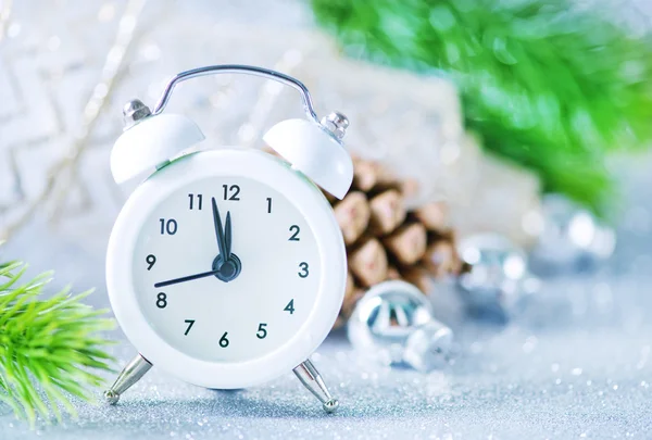 White clock on white table — Stock Photo, Image