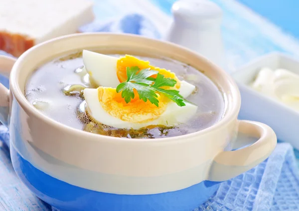 Green soup with eggs — Stock Photo, Image