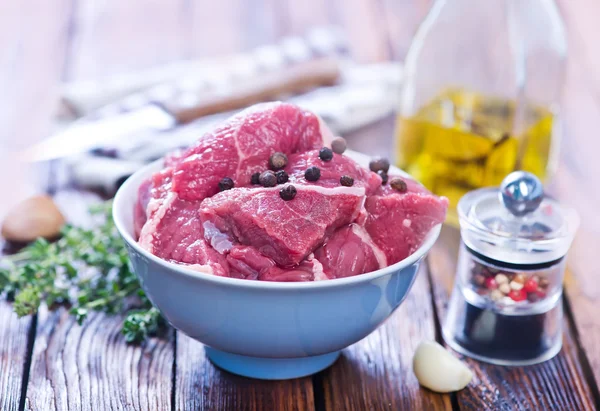 Raw meat with spices — Stock Photo, Image