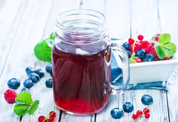 Berry compote in glass jar — Stock Photo, Image