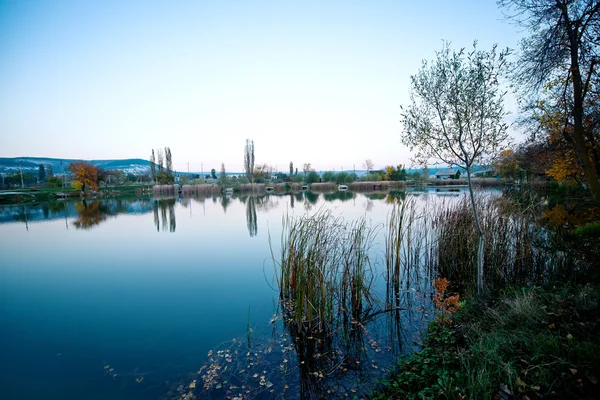 Sunset at autumn lake — Stock Photo, Image