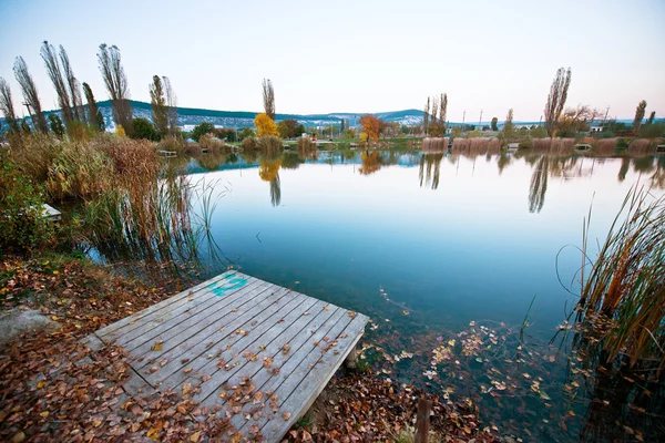 Sunset at autumn lake — Stock Photo, Image