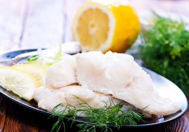 Close-up van een harige huisvlieg met rode ogen