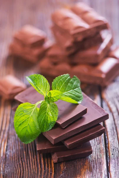 Chocolate with mint on table — Stock Photo, Image