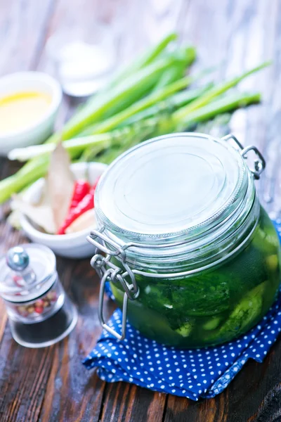 Picled cucumbers in jar — Stock Photo, Image
