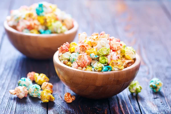 Bowls of colored popcorn — Stock Photo, Image