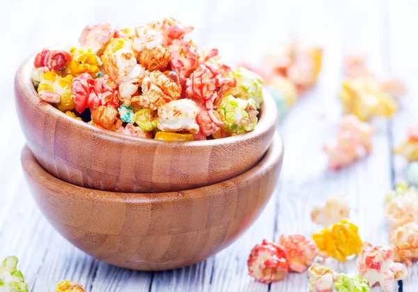 Bowls of colored popcorn — Stock Photo, Image