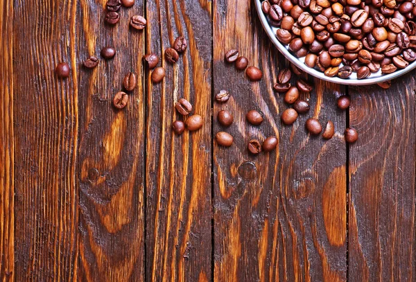 Coffee beans on metal plate — Stock Photo, Image