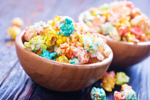 Bowls of colored popcorn — Stock Photo, Image