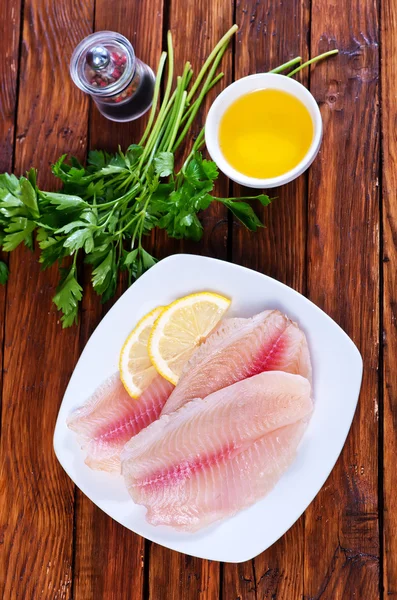 Raw fish fillet with spices — Stock Photo, Image