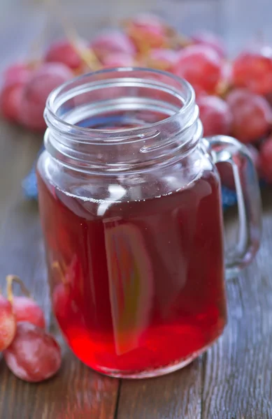 Szklanka soku winogronowego — Zdjęcie stockowe