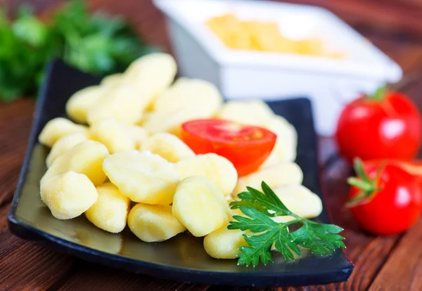 Plate with potato gnocchi — Stock Photo, Image