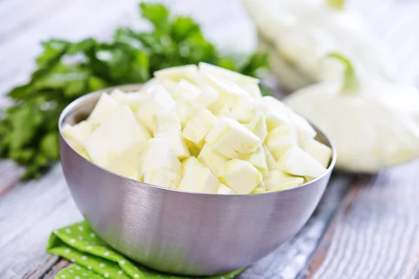 Bowl of chopped raw pattisons — Stock Photo, Image