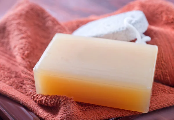 Soaps and towel — Stock Photo, Image