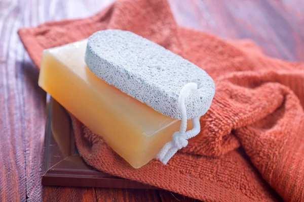 Soaps and towel — Stock Photo, Image