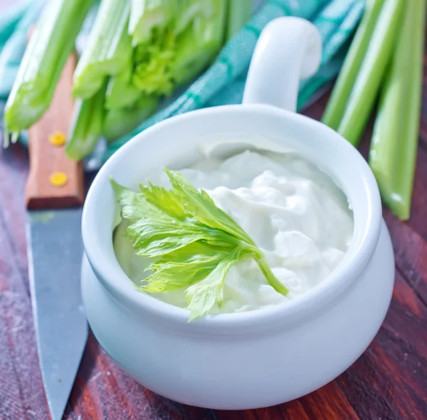Fresh celery and white sauce — Stock Photo, Image