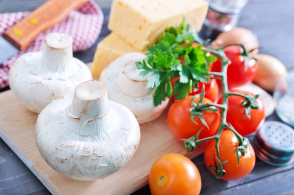 Mushroom and tomato with cheese — Stock Photo, Image