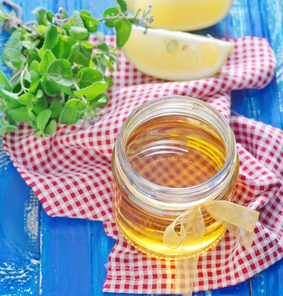 Honey with lemon — Stock Photo, Image