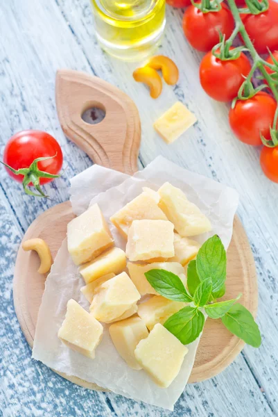 Cheese with basil — Stock Photo, Image