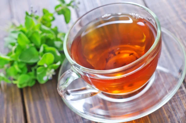 Fresh tea in cup — Stock Photo, Image