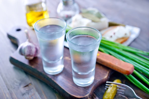 Vodka, lard and cucumbers — Stock Photo, Image