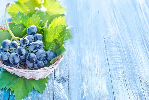 Grape on wooden background — Stock Photo, Image